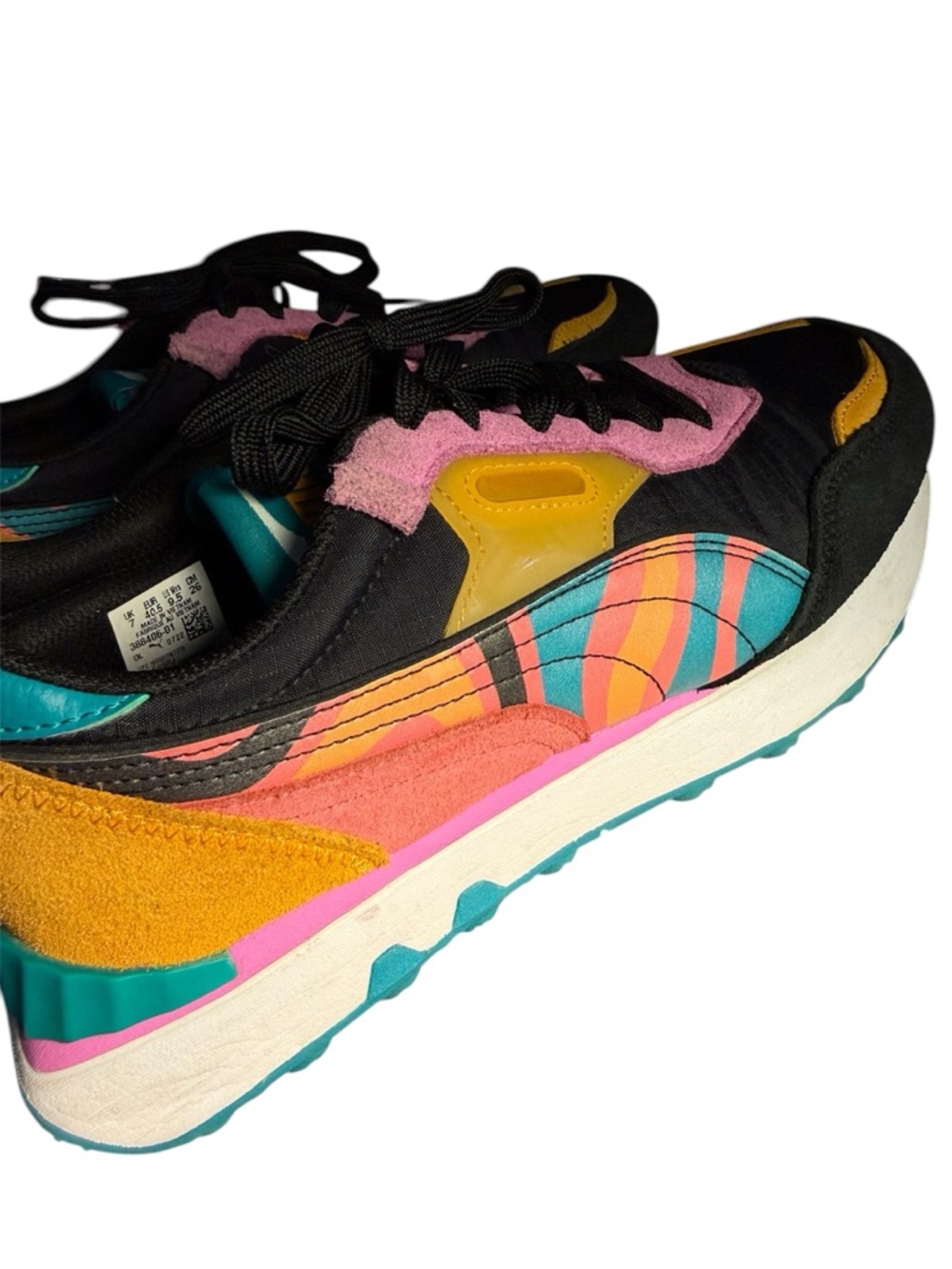 The PUMA Rider FV Lava Sneaker - Black Pink Yellow Turquoise